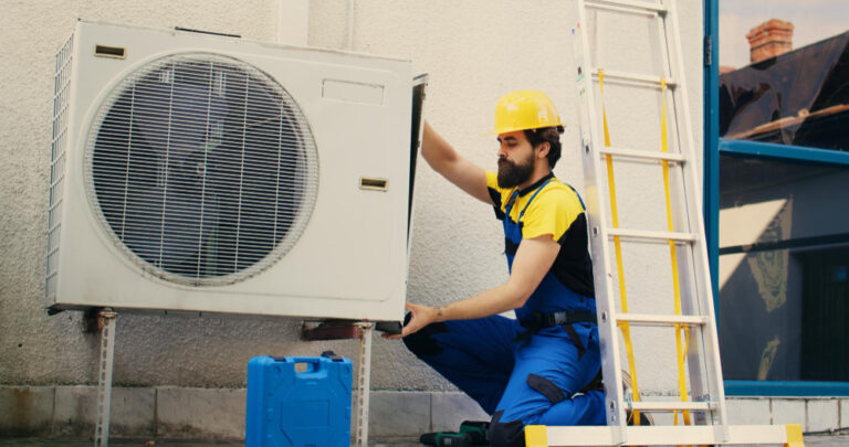 Professional HVAC technician inspecting and repairing an air conditioning unit in Laurel, MD